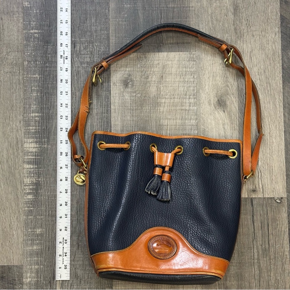 Dooney & Bourke Vintage 90s Navy/Tan Drawstring Bucket Bag, pre-loved condition